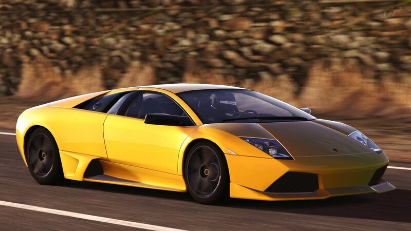 yellow sports car on road