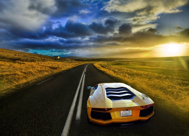 Yellow Sports Car on Road — Dramatic, Sunset, Photograph, Field