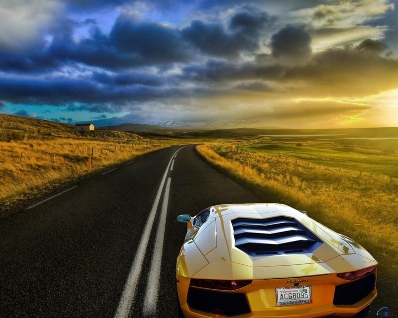 Yellow Sports Car on Road — Dramatic, Sunset