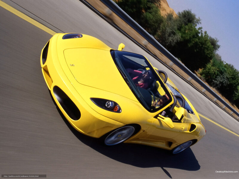 yellow sports car on road