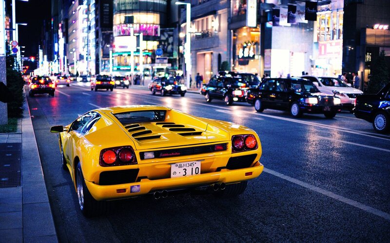 Yellow Sports Car on Street — Dramatic