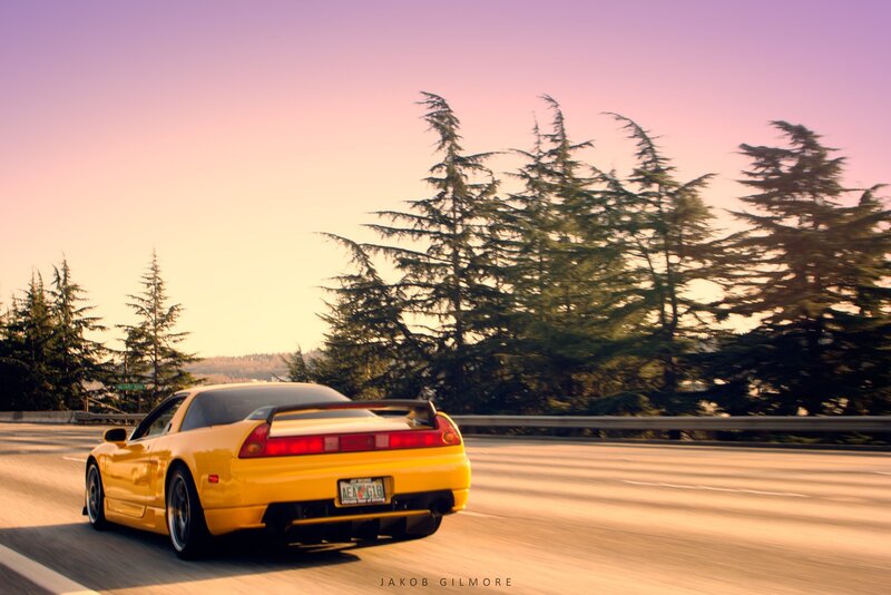 Yellow sports car on the road