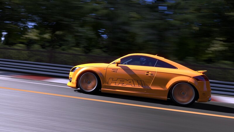 yellow sports car on track