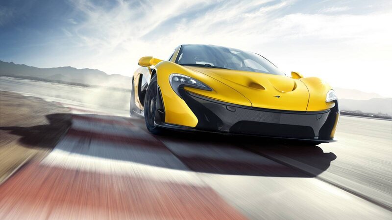 yellow sports car on track