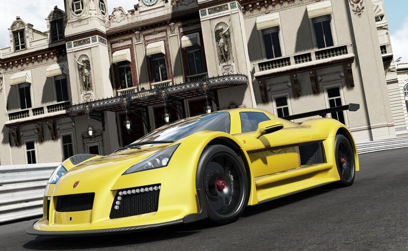yellow sports car on track