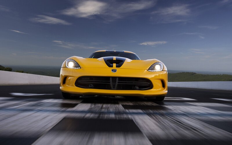 Yellow sports car on track