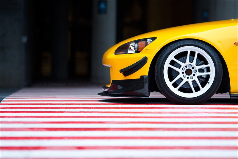 Yellow sports car on track