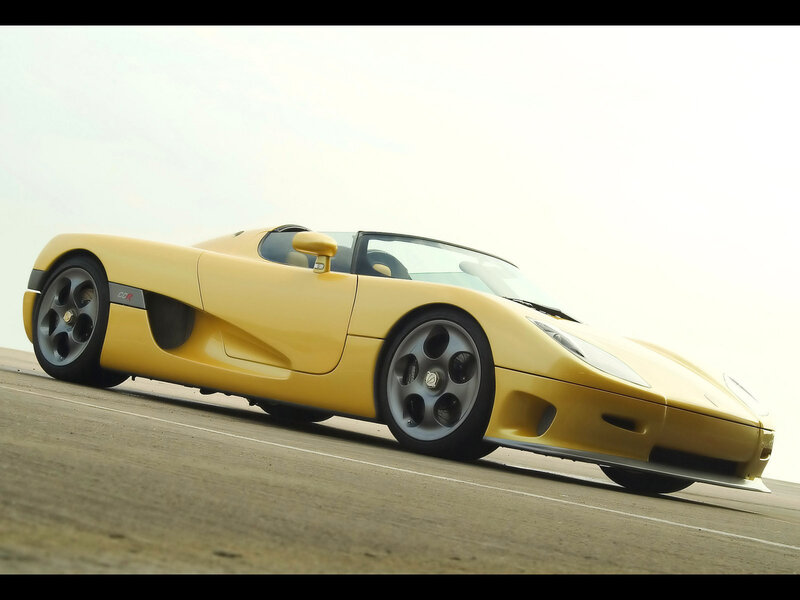 yellow sports car on track
