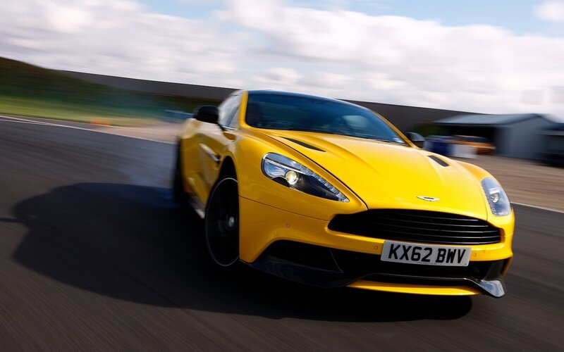 Yellow sports car on track