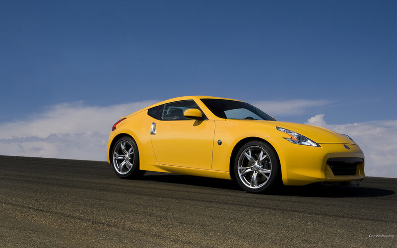 Yellow sports car on track