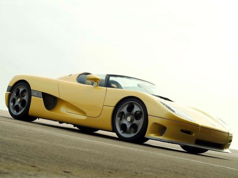 yellow sports car on track