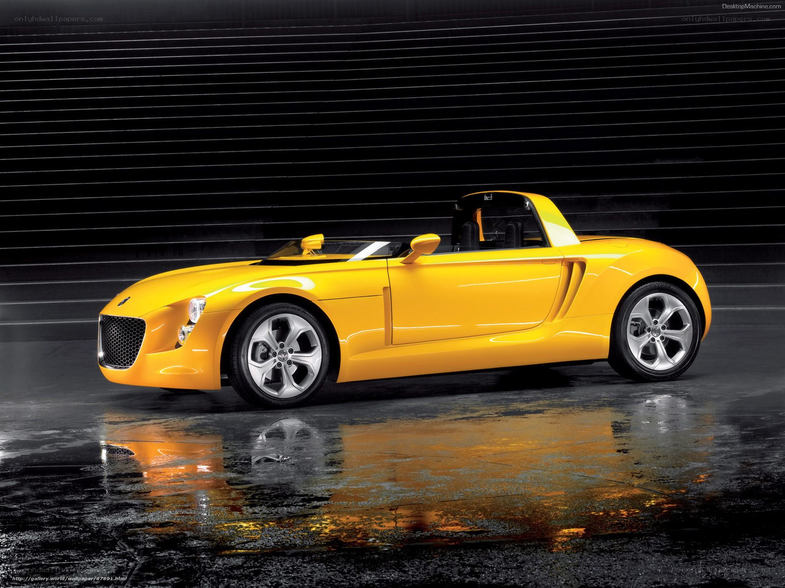 Yellow sports car on wet floor
