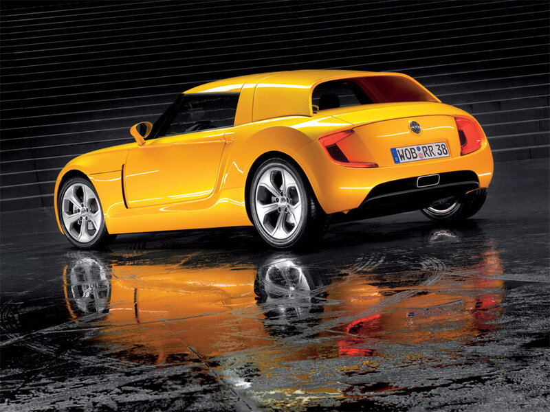 Yellow sports car on wet surface