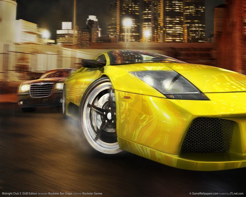 Yellow sports car racing at night