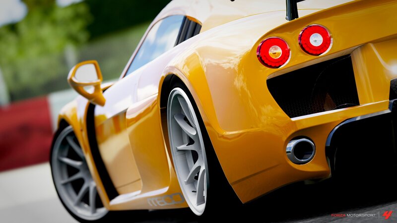 yellow sports car rear view