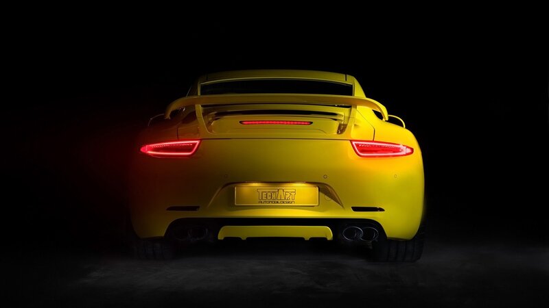 yellow sports car rear view