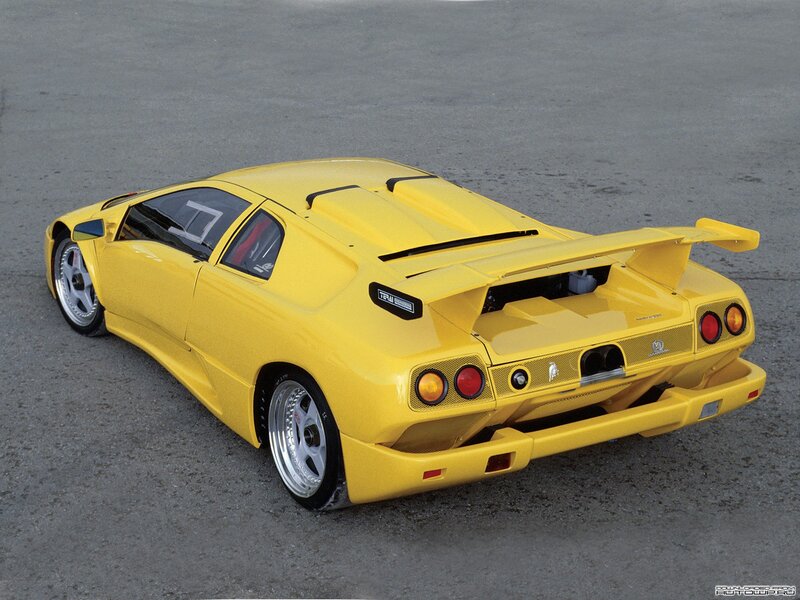 yellow sports car rear view