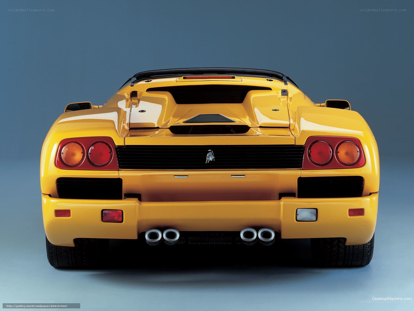 yellow sports car rear view