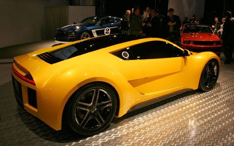 Yellow Sports Car — Showroom, Photograph, People, Blue Car
