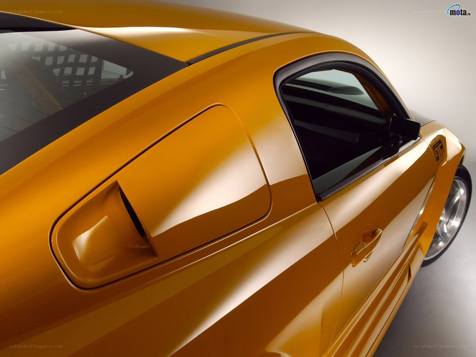yellow sports car side view