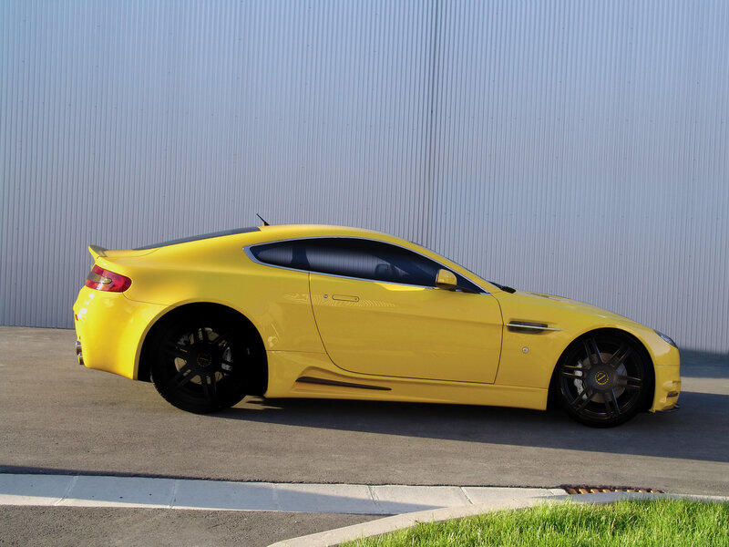 yellow sports car side view