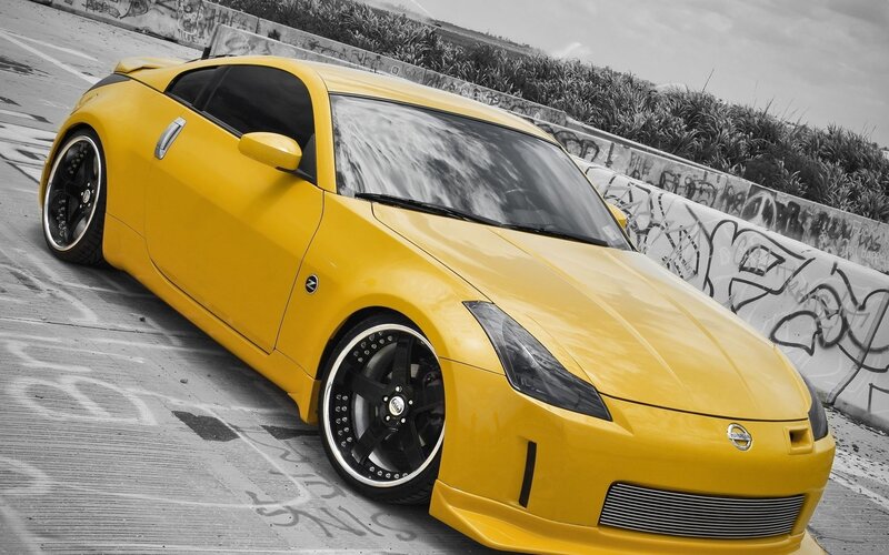 Yellow Sports Car — Urban, Photograph, Graffiti Wall