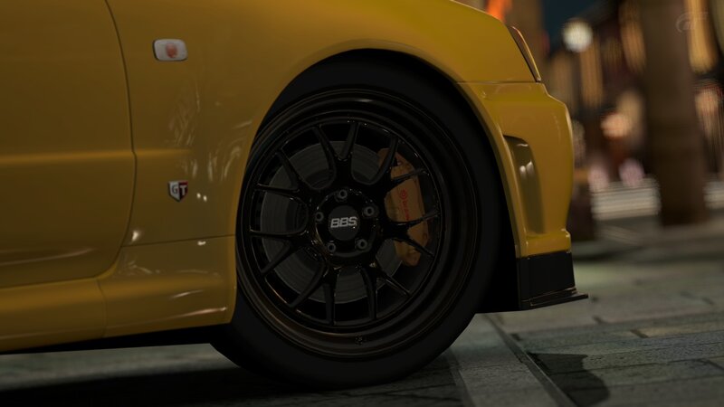 yellow sports car wheel