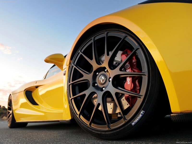 Yellow Sports Car Wheel — Dramatic, Sunset
