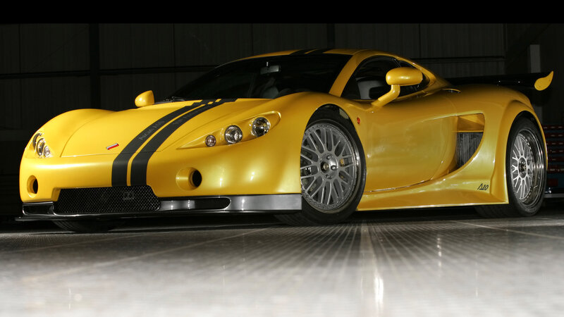 yellow sports car with black stripes