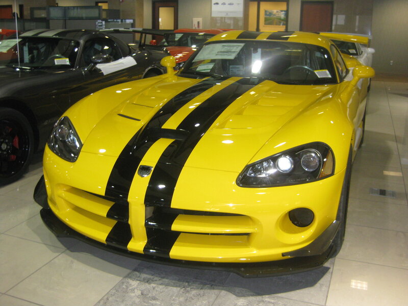 Yellow sports car with black stripes