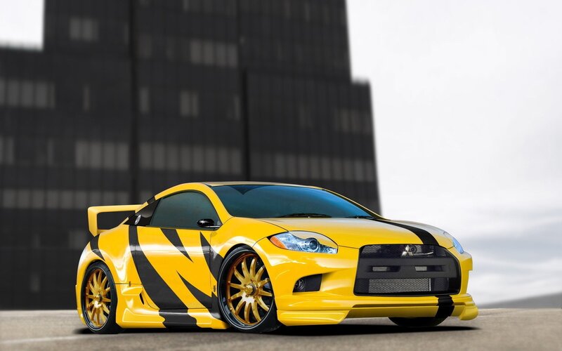 yellow sports car with black stripes