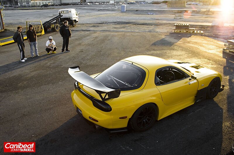 Yellow sports car with friends