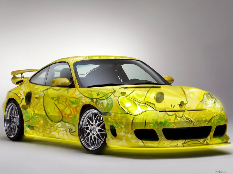 yellow sports car with graphic design