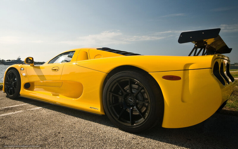 Yellow sports car with large wing