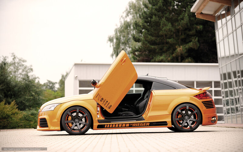 yellow sports car with open door