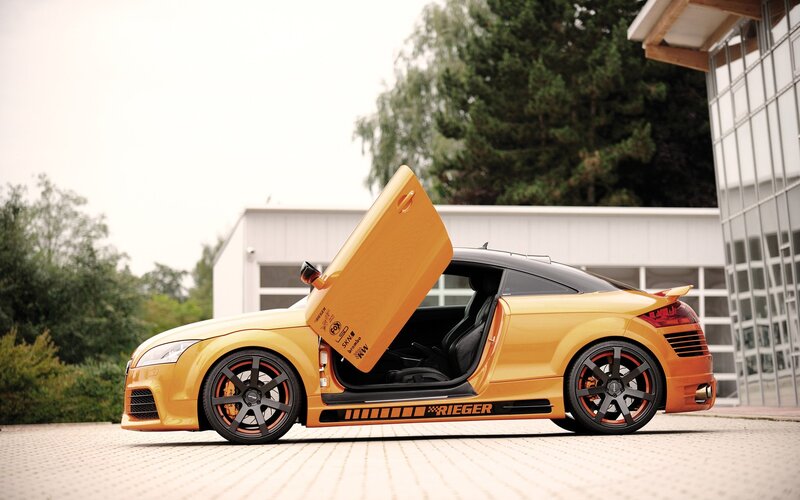 yellow sports car with open door