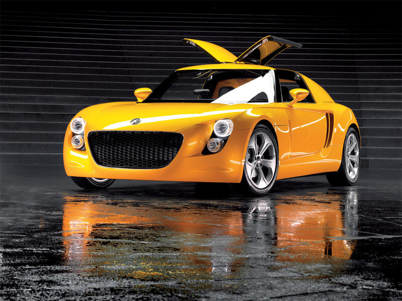 Yellow sports car with open doors