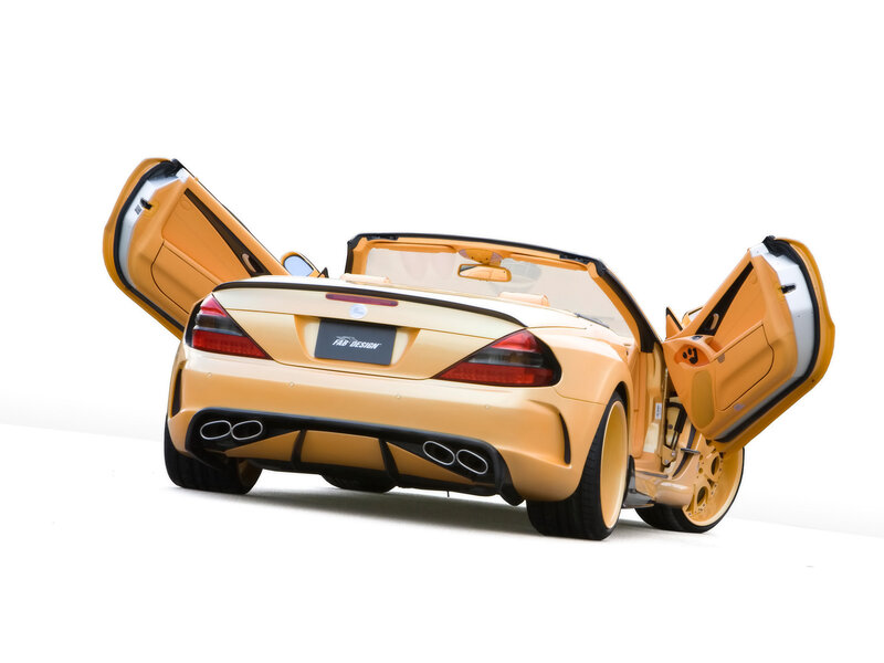 yellow sports car with open doors