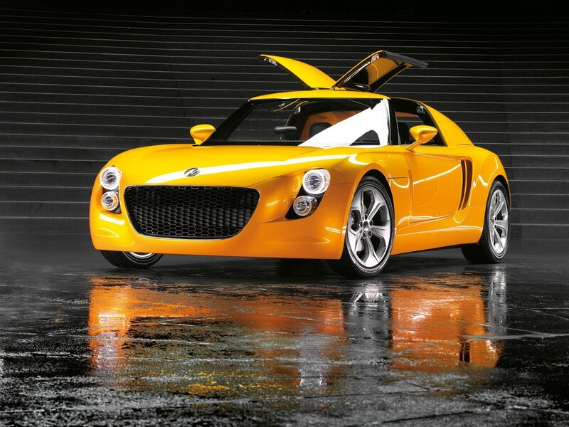 Yellow sports car with open doors