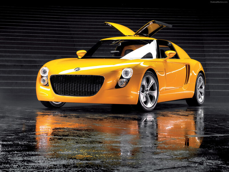 Yellow sports car with open doors
