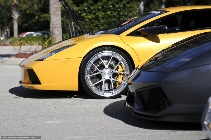 Yellow sports car with open hood