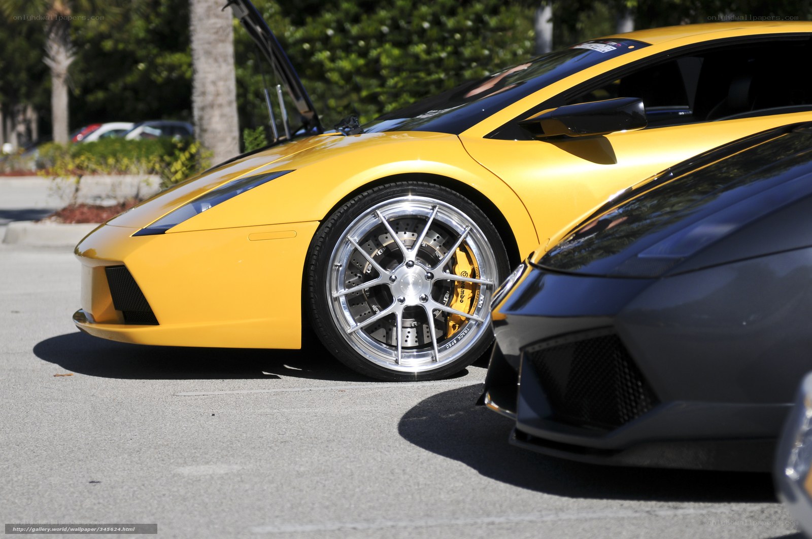 Yellow sports car with open hood