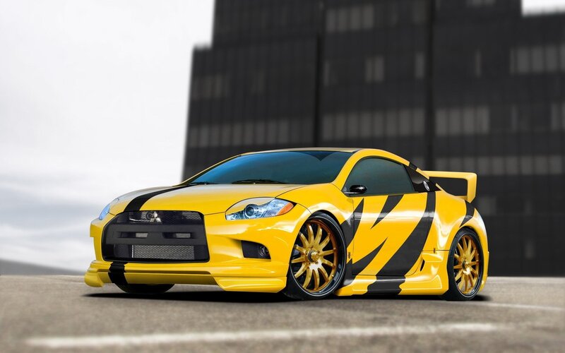 yellow sports car with stripes