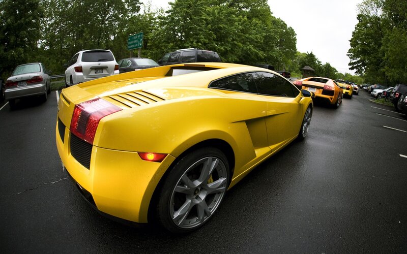 Yellow sports cars in a line
