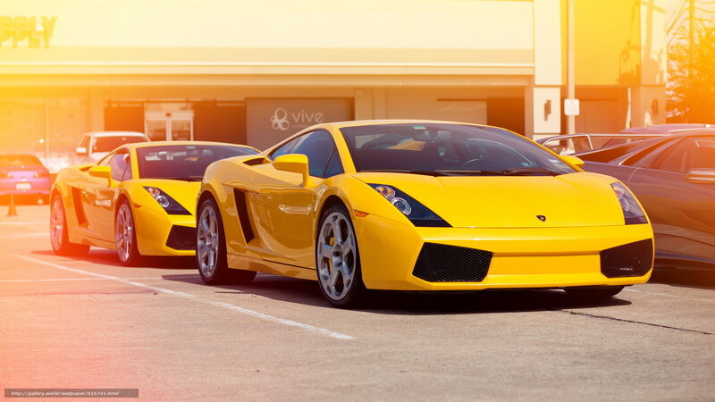 Yellow sports cars in parking lot