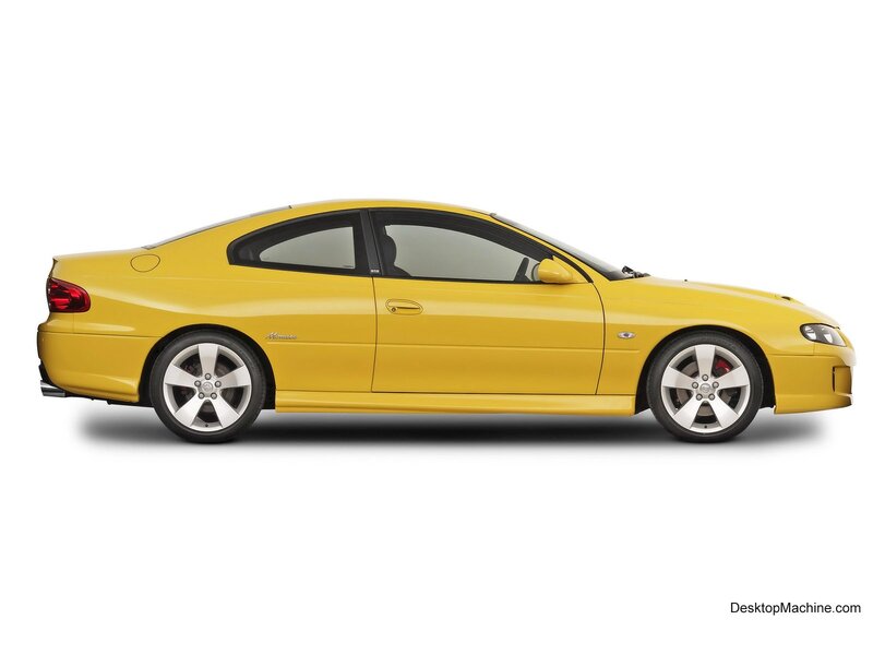 yellow sports coupe car