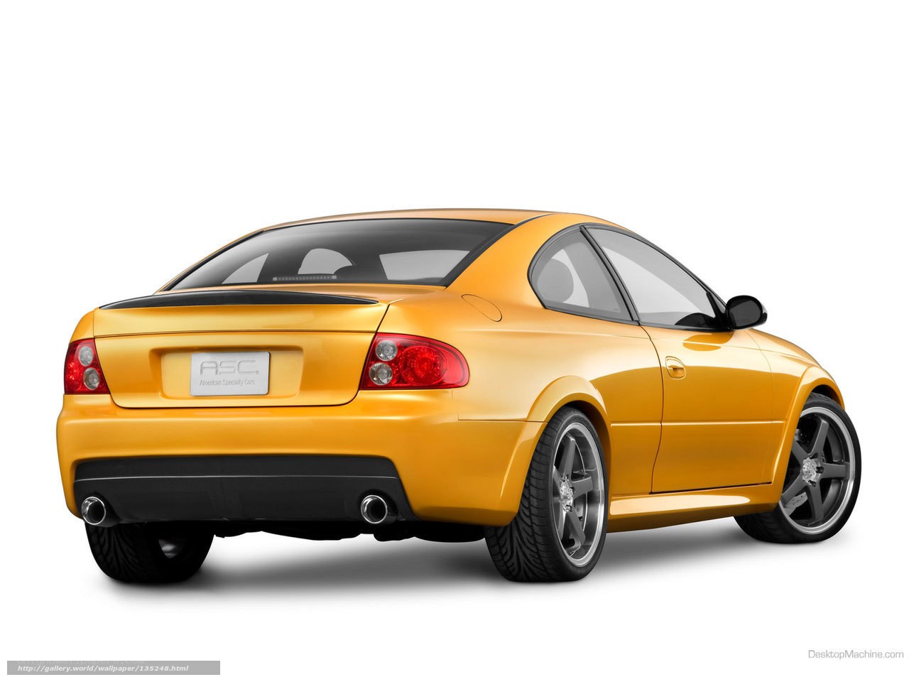 yellow sports coupe rear view
