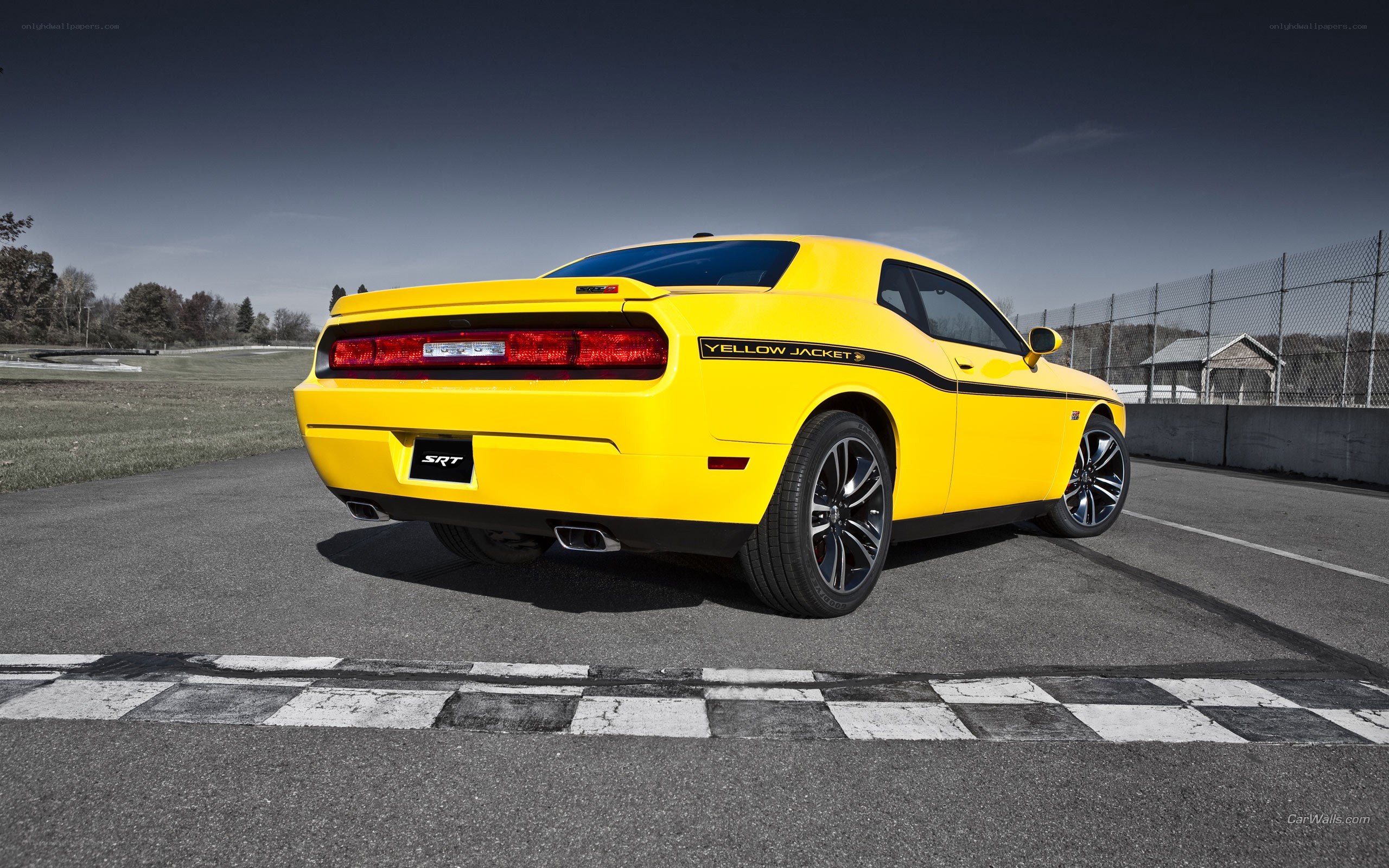 Yellow SRT Challenger on track