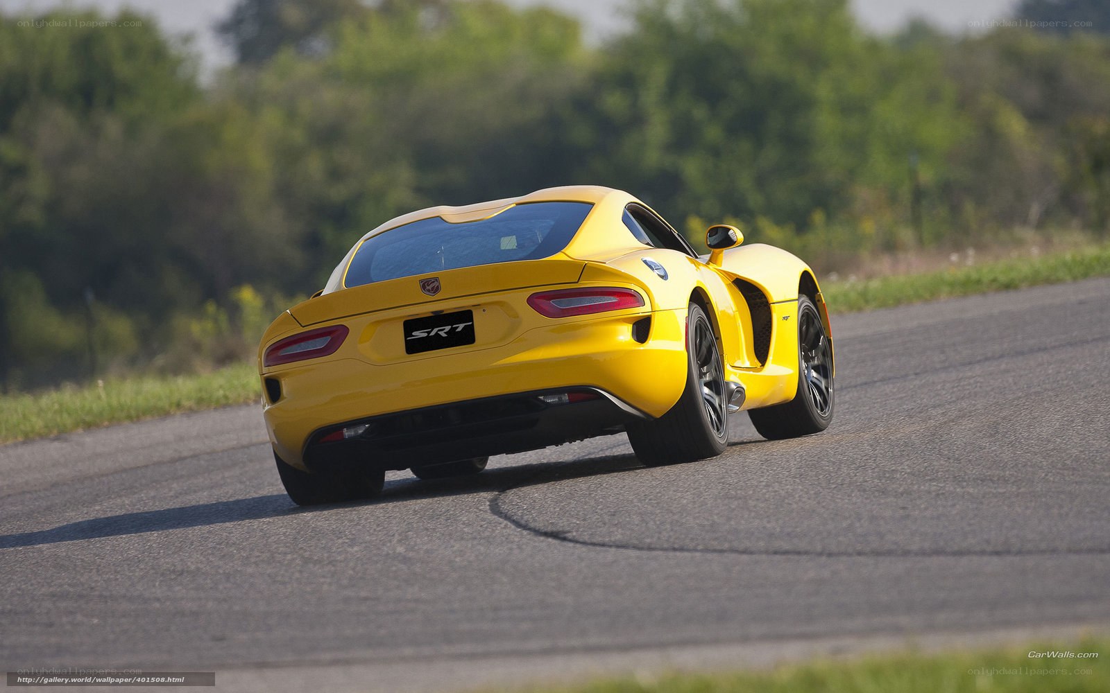 yellow srt on a track