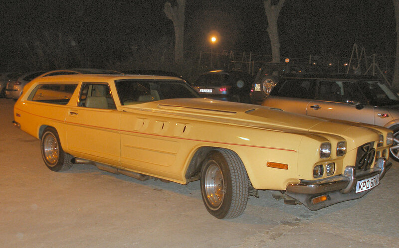 yellow station wagon at night